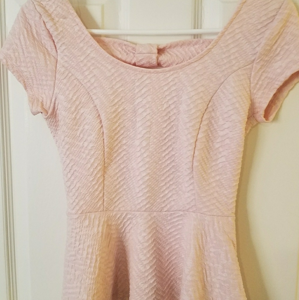 Cute pink bowtie back peplum top